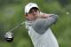 Rory McIlroy watches his tee shot on the 11th hole during the first round of the Wells Fargo Championship golf tournament in Charlotte, N.C., Thursday, May 1, 2014. (AP Photo/Chuck Burton)