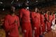 Members of the Los Angeles Clippers listen to the national anthem before Game 4 of an opening-round NBA basketball playoff series against the Golden State Warriors on Sunday, April 27, 2014, in Oakland, Calif. The Clippers chose not to speak publicly about owner Donald Sterling. Instead, they made a silent protest. The players wore their red Clippers' warmup shirts inside out to hide the team's logo. (AP Photo/Marcio Jose Sanchez)