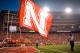 LINCOLN, NE - AUGUST 31: A flag is waved after a Nebraska Cornhuskers during their game against the Wyoming Cowboys at Memorial Stadium on August 31, 2013 in Lincoln, Nebraska. (Photo by Eric Francis/Getty Images)