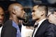 Floyd Mayweather Jr., left, and Marcos Maidana pose for photos during a news conference Wednesday, April 30, 2014, in Las Vegas. The pair square off in a welterweight title fight on Saturday, May 3. (AP Photo/Isaac Brekken)