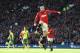 MANCHESTER, ENGLAND - APRIL 26: Wayne Rooney of Manchester United celebrates his first half penalty during the Barclays Premier League match between Manchester United and Norwich City at Old Trafford on April 26, 2014 in Manchester, England. (Photo by Laurence Griffiths/Getty Images)