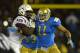 UCLA linebacker Anthony Barr, right, tires to get by Arizona State tight end De'Marieya Nelson during the first half an NCAA college football game, Saturday, Nov. 23, 2013, in Pasadena. (AP Photo/Mark J. Terrill)