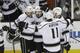 Los Angeles Kings defenseman Drew Doughty, second from left, celebrates with teammates after scoring a goal against the San Jose Sharks during the second period of Game 7 of an NHL hockey first-round playoff series in San Jose, Calif., Wednesday, April 30, 2014. (AP Photo)