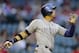 Colorado Rockies' Carlos Gonzalez watches his two run home run take flight against the Arizona Diamondbacks during the first inning of a baseball game on Wednesday, April 30, 2014, in Phoenix. (AP Photo/Matt York)