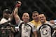 Wanderlei Silva, second from left, celebrates Fabricio Werdum, second from right, and teammates after beating Cung Le during a UFC 139 Mixed Martial Arts middleweight bout in San Jose, Calif., Saturday, Nov. 19, 2011. Silva won by TKO in the second round. (AP Photo/Jeff Chiu)