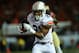 PASADENA, CA - JANUARY 06: Running back Tre Mason #21 of the Auburn Tigers runs for a 12-yard touchdown against the Florida State Seminoles in the first quarter of the 2014 Vizio BCS National Championship Game at the Rose Bowl on January 6, 2014 in Pasadena, California. (Photo by Stephen Dunn/Getty Images)