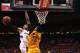 ATLANTA, GA - MAY 1: Mike Scott #32 of the Atlanta Hawks goes up for a dunk against the Indiana Pacers during Game Six of the Eastern Conference Quarterfinals on May 1, 2014 at Philips Arena in Atlanta, Georgia. NOTE TO USER: User expressly acknowledges and agrees that, by downloading and/or using this Photograph, user is consenting to the terms and conditions of the Getty Images License Agreement. Mandatory Copyright Notice: Copyright 2014 NBAE (Photo by Gary Dineen/NBAE via Getty Images)