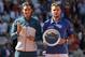 Rafael Nadal from Spain, left, holds the trophy during the awards ceremony after winning the final of the Madrid Open tennis tournament against Stanislas Wawrinka from Switzerland, right, in Madrid Sunday, May 12, 2013.(AP Photo/Andres Kudacki)