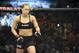 Feb 22, 2014; Las Vegas, NV, USA; Ronda Rousey (red gloves) prior to the start of her fight against Sara McMann (blue gloves) for their UFC bantamweight championship bout at Mandalay Bay. Mandatory Credit: Stephen R. Sylvanie-USA TODAY Sports