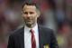 Manchester United's interim manager Ryan Giggs takes to the touchline before his team's English Premier League soccer match against Norwich City at Old Trafford Stadium, Manchester, England, Saturday April 26, 2014. (AP Photo/Jon Super)