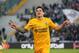 Verona's Juan Manuel Iturbe celebrates after scoring, during a Serie A soccer match between Udinese and Verona at the Friuli Stadium in Udine, Italy, Monday, Jan. 6, 2014. (AP Photo/Paolo Giovannini)
