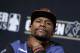 Boxer Floyd Mayweather Jr. listens during a news conference Wednesday, April 30, 2014, in Las Vegas. Mayweather will face Marcos Maidana in a welterweight title fight on Saturday, May 3. (AP Photo/Isaac Brekken)