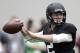 Texas A&M quarterback Johnny Manziel passes the ball during a drill at pro day for NFL football representatives in College Station, Texas, Thursday, March 27, 2014. (AP Photo/Patric Schneider)