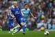 MANCHESTER, ENGLAND - OCTOBER 05: Steven Naismith (L) of Everton passes as James Milner (R) of Manchester City closes in during the Barclays Premier League match between Manchester City and Everton at the Etihad Stadium on October 5, 2013 in Manchester, England. (Photo by Michael Steele/Getty Images)