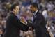 Apr 7, 2014; Arlington, TX, USA; Kentucky Wildcats head coach John Calipari shakes hands with Connecticut Huskies head coach Kevin Ollie before the championship game of the Final Four in the 2014 NCAA Mens Division I Championship tournament at AT&T Stadium. Mandatory Credit: Robert Deutsch-USA TODAY Sports