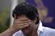 Kolkata Knight Riders team co-owner and Bollywood star Shah Rukh Khan gestures during a press conference at his residence in Mumbai, India, Wednesday, May 30, 2012. Kolkata Knight Riders won the Indian Premier League (IPL) cricket title on Sunday, defeating two-time defending champion Chennai Super Kings by five wickets in a high-scoring final. (AP Photo/Rafiq Maqbool)