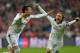 Real's Cristiano Ronaldo celebrates with teammate Luka Modric, right, after scoring his side's 4rd goal during the Champions League semifinal second leg soccer match between Bayern Munich and Real Madrid at the Allianz Arena in Munich, southern Germany, Tuesday, April 29, 2014. (AP Photo/Kerstin Joensson)