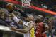 Indiana Pacers' David West (21) has his shot blocked by Atlanta Hawks' Paul Millsap (4) during the second half in Game 5 of an opening-round NBA basketball playoff series Monday, April 28, 2014, in Indianapolis. Atlanta defeated Indiana 107-97. (AP Photo/Darron Cummings)