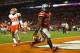 MIAMI GARDENS, FL - JANUARY 03: Carlos Hyde #34 of the Ohio State Buckeyes scores a touchdown in the fourth quarter against the Clemson Tigers during the Discover Orange Bowl at Sun Life Stadium on January 3, 2014 in Miami Gardens, Florida. (Photo by Streeter Lecka/Getty Images)