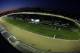 In this image taken with a fisheye lens, horses make their way around the track for a morning workout at Churchill Downs Friday, May 2, 2014, in Louisville, Ky. (AP Photo/Charlie Riedel)