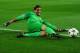 MADRID, SPAIN - APRIL 09: Jose Manuel Pinto of Barcelona clears the ball during the UEFA Champions League Quarter Final second leg match between Club Atletico de Madrid and FC Barcelona at Vicente Calderon Stadium on April 9, 2014 in Madrid, Spain. (Photo by Laurence Griffiths/Getty Images)