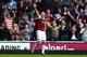 LONDON, ENGLAND - MAY 03: Andy Carroll of West Ham celebrates after his team take a 1-0 lead following an own goal by Harry Kane of Spurs during the Barclays Premier League match between West Ham United and Tottenham Hotspur at Boleyn Ground on May 3, 2014 in London, England. (Photo by Paul Gilham/Getty Images)