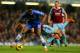 LONDON, ENGLAND - JANUARY 29: Stewart Downing of West Ham clashes with John Obi Mikel of Chelsea during the Barclays Premier League match between Chelsea and West Ham United at Stamford Bridge on January 29, 2014 in London, England. (Photo by Ian Walton/Getty Images)