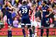 STOKE ON TRENT, ENGLAND - MAY 03: (L-R) Steve Sidwell, Darren Bent and Konstantinos Mitroglou of Fulham react as their side concedes a third goal during the Barclays Premier League match between Stoke City and Fulham at the Britannia Stadium on May 3, 2014 in Stoke on Trent, England. (Photo by Jamie McDonald/Getty Images)