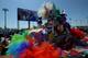 LOUISVILLE, KY - MAY 03: A race fan wearing a festive hat looks on from the infield prior to the 140th running of the Kentucky Derby at Churchill Downs on May 3, 2014 in Louisville, Kentucky. (Photo by Dylan Buell/Getty Images)