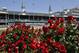 May 3, 2014; Louisville, KY, USA; A general view of roses in the infield with the twin spires in the background before the 2014 Kentucky Derby at Churchill Downs. Mandatory Credit: Jamie Rhodes-USA TODAY Sports