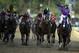 Victor Espinoza rides California Chrome to a victory during the 140th running of the Kentucky Derby horse race at Churchill Downs Saturday, May 3, 2014, in Louisville, Ky. (AP Photo/Darron Cummings)