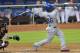 May 3, 2014; Miami, FL, USA; Los Angeles Dodgers right fielder Yasiel Puig (66) connects for a three run homer during the fourth inning against the Miami Marlins at Marlins Ballpark. Mandatory Credit: Steve Mitchell-USA TODAY Sports