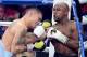 LAS VEGAS, NV - MAY 03: (R-L) Floyd Mayweather Jr. throws a right to the face of Marcos Maidana during their WBC/WBA welterweight unification fight at the MGM Grand Garden Arena on May 3, 2014 in Las Vegas, Nevada. (Photo by Ethan Miller/Getty Images)