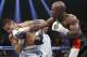 Floyd Mayweather Jr., right, connects with a right to the head of Marcos Maidana, from Argentina, in their WBC-WBA welterweight title boxing fight Saturday, May 3, 2014, in Las Vegas. (AP Photo/Eric Jamison)