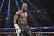 Floyd Mayweather Jr. stands in the ring during his WBC-WBA welterweight title boxing fight against Marcos Maidana Saturday, May 3, 2014, in Las Vegas. (AP Photo/Isaac Brekken)