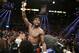 Floyd Mayweather Jr. celebrates his WBC-WBA welterweight title boxing fight victory over Marcos Maidana Saturday, May 3, 2014, in Las Vegas. (AP Photo/Eric Jamison)