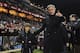 Jose Mourinho from Portugal, centre right, with his son, during a charity soccer match