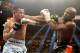 LAS VEGAS, NV - MAY 03: (L-R) Marcos Maidana and Floyd Mayweather Jr. exchange blows during their WBC/WBA welterweight unification fight at the MGM Grand Garden Arena on May 3, 2014 in Las Vegas, Nevada. Mayweather took Maidana's title with a majority-decision victory. (Photo by Harry How/Getty Images)