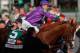 LOUISVILLE, KY - MAY 03: Jockey Victor Espinoza cools down California Chrome #5 on the way to the winners circle after winning the 140th running of the Kentucky Derby at Churchill Downs on May 3, 2014 in Louisville, Kentucky. (Photo by Kevin C. Cox/Getty Images)