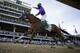 Victor Espinoza rides California Chrome to a victory during the 140th running of the Kentucky Derby horse race at Churchill Downs Saturday, May 3, 2014, in Louisville, Ky. (AP Photo/David J. Phillip)