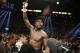 Floyd Mayweather Jr. celebrates his WBC-WBA welterweight title boxing fight victory over Marcos Maidana Saturday, May 3, 2014, in Las Vegas. (AP Photo/Eric Jamison)