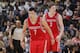 OAKLAND, CA - FEBRUARY 12: Jeremy Lin #7 and Omer Asik #3 of the Houston Rockets in a game against the Golden State Warriors on February 12, 2013 at Oracle Arena in Oakland, California. NOTE TO USER: User expressly acknowledges and agrees that, by downloading and or using this photograph, user is consenting to the terms and conditions of Getty Images License Agreement. Mandatory Copyright Notice: Copyright 2013 NBAE (Photo by Rocky Widner/NBAE via Getty Images)