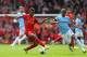 LIVERPOOL, ENGLAND - APRIL 13: Raheem Sterling of Liverpool competes with Fernandinho of Manchester City during the Barclays Premier League match between Liverpool and Manchester City at Anfield on April 13, 2014 in Liverpool, England. (Photo by Alex Livesey/Getty Images)