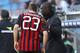 GENOA, ITALY - FEBRUARY 23: Coach Clarence Seedorf of AC Milan issues instructions to his player Adel Taarabt during the Serie A match between UC Sampdoria and AC Milan at Stadio Luigi Ferraris on February 23, 2014 in Genoa, Italy. (Photo by Marco Luzzani/Getty Images)
