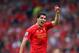 LIVERPOOL, ENGLAND - APRIL 27: Luis Suarez of Liverpool signals during the Barclays Premier League match between Liverpool and Chelsea at Anfield on April 27, 2014 in Liverpool, England. (Photo by Clive Brunskill/Getty Images)