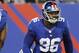 New York Giants defensive tackle Marvin Austin (96) celebrates after sacking New York Jets quarterback Mark Sanchez (6) during the second half of a preseason NFL football game, Saturday, Aug. 24, 2013, in East Rutherford, N.J. (AP Photo/Bill Kostroun)