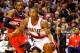 Jan 21, 2013; Portland, OR, USA; Portland Trail Blazers point guard Damian Lillard (0) drives past Washington Wizards point guard John Wall (2) at the Rose Garden. Mandatory Credit: Craig Mitchelldyer-USA TODAY Sports