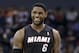 Miami Heat's LeBron James as he walks down the court during the second half in Game 4 of an opening-round NBA basketball playoff series against the Charlotte Bobcats in Charlotte, N.C., Monday, April 28, 2014. The Heat won 109-98, sweeping the series. (AP Photo/Chuck Burton)