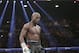 Floyd Mayweather Jr. stands in the ring during his WBC-WBA welterweight title boxing fight against Marcos Maidana Saturday, May 3, 2014, in Las Vegas. (AP Photo/Isaac Brekken)