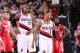 PORTLAND, OR - MAY 2: LaMarcus Aldridge #12 and Damian Lillard #0 of the Portland Trail Blazers walk off the court against the Houston Rockets in Game Six of the Western Conference Quarterfinals during the 2014 NBA Playoffs on May 2, 2014 at the Moda Center in Portland, Oregon. NOTE TO USER: User expressly acknowledges and agrees that, by downloading and or using this photograph, User is consenting to the terms and conditions of the Getty Images License Agreement. Mandatory Copyright Notice: Copyright 2014 NBAE (Photo by Sam Forencich/NBAE via Getty Images)